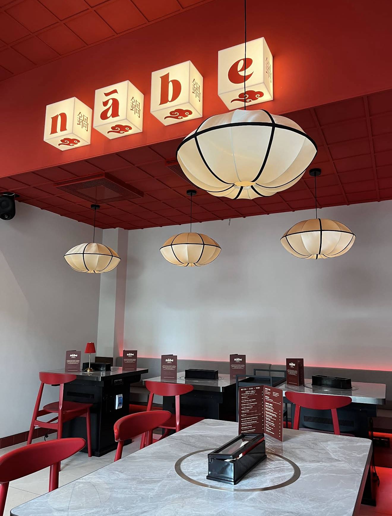 nābe lightbox letters above the dining room